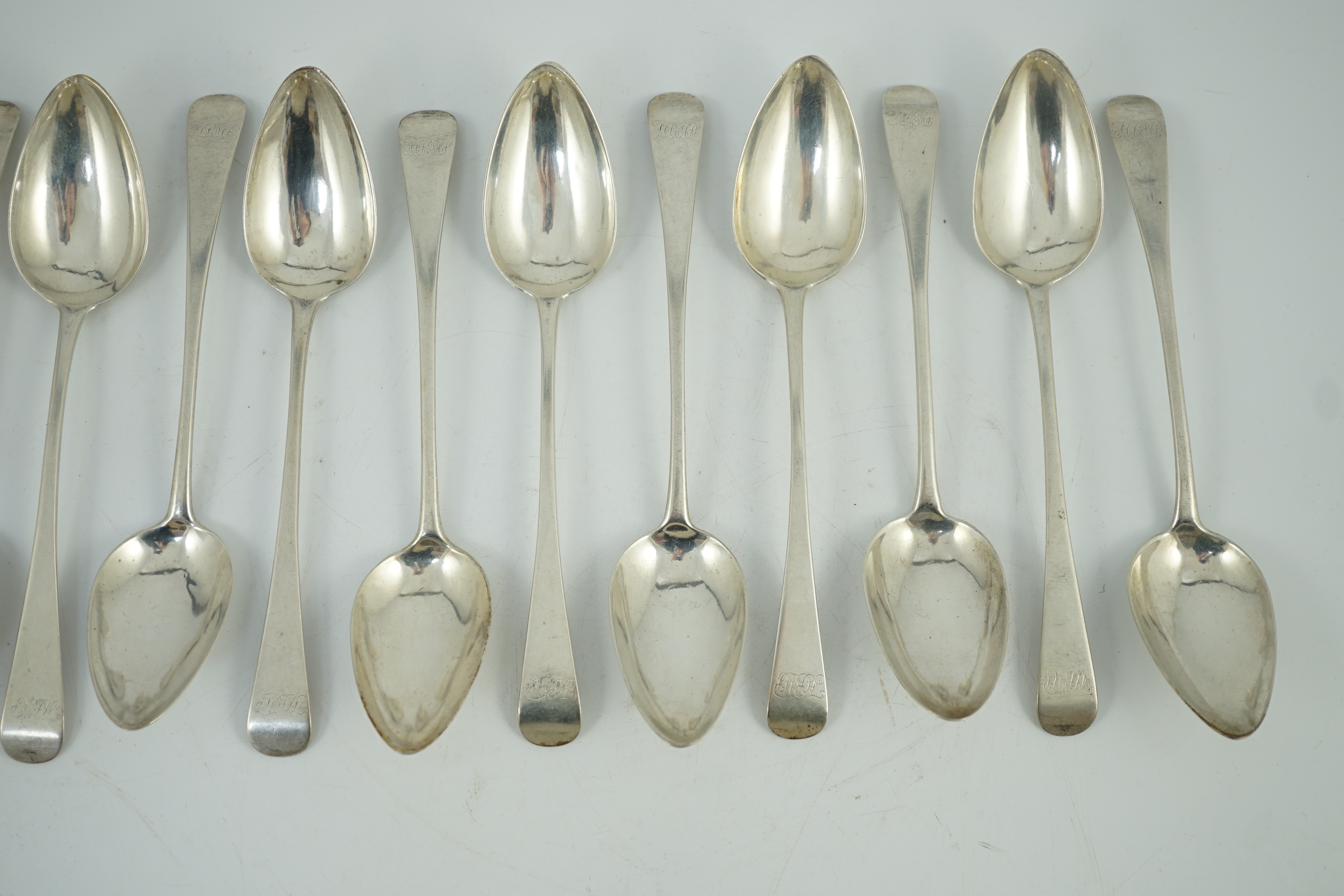 A rare set of twelve George III provincial Scottish silver Old English pattern table spoons, by David Isat, Banff